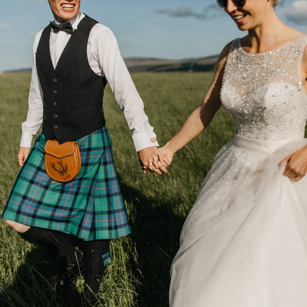 Scottish Micro Wedding Bride Groom in kilt Walking Laughing in field