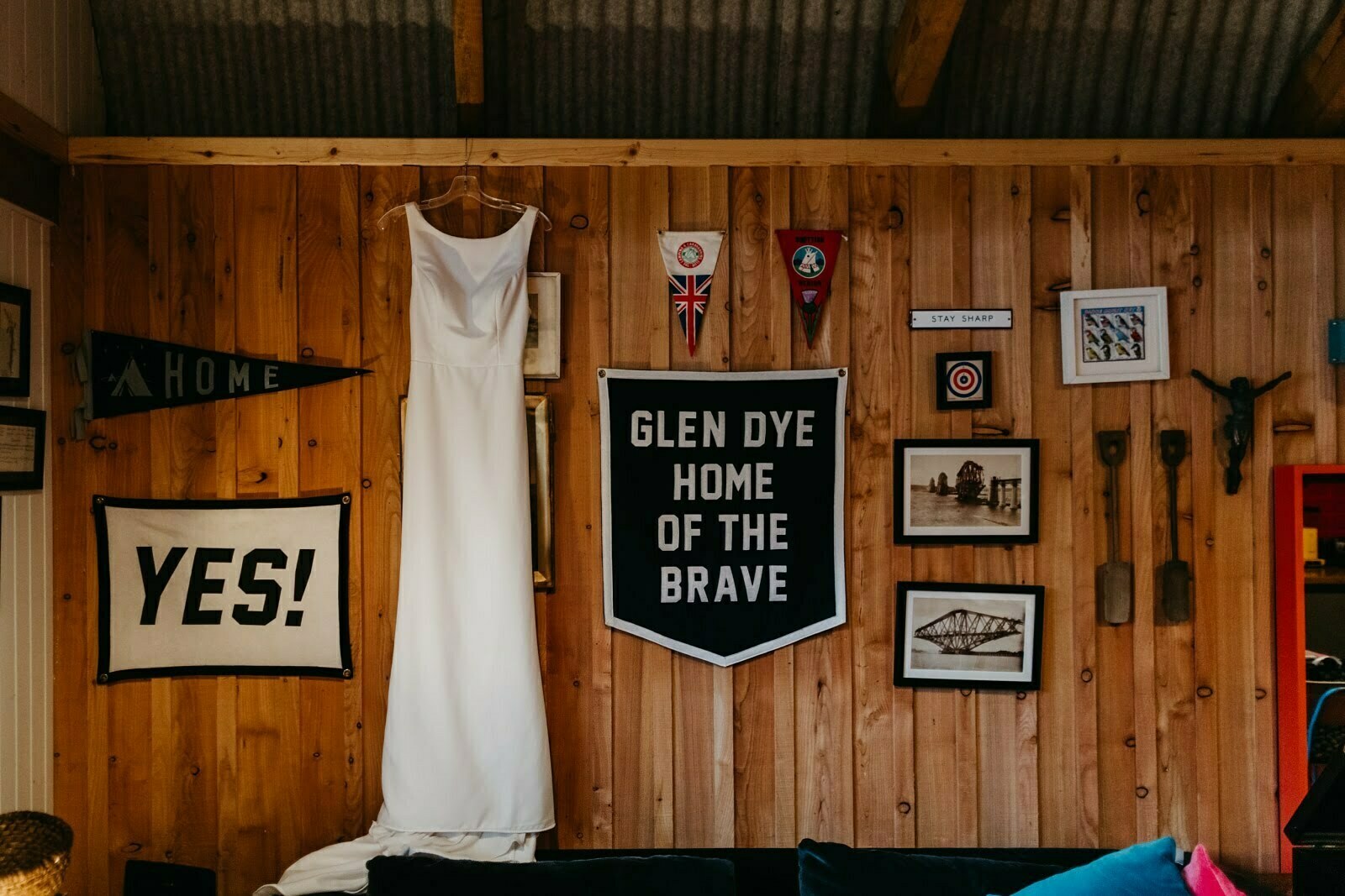 micro wedding planner scotland at glen dye estate and cabins woodland wedding aberdeenshire wedding dress hanging up