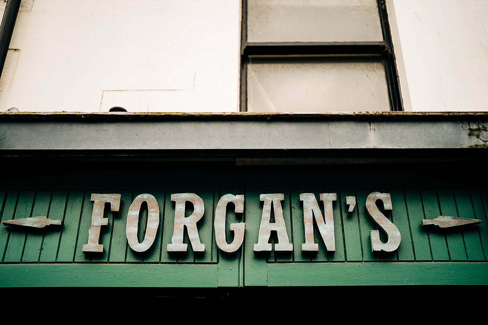 colourful forgans micro wedding building exterior wooden sign