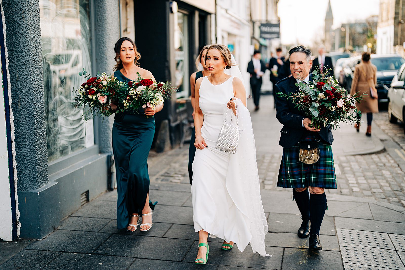 colourful forgans micro wedding bride bridesmaids bouquets green velvet jimmy choo shoes made with love long white bridal dress pearl handbag