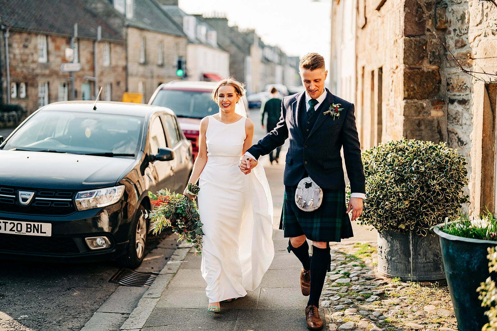 colourful forgans micro wedding bride groom st andrews cobbled street couples portrait