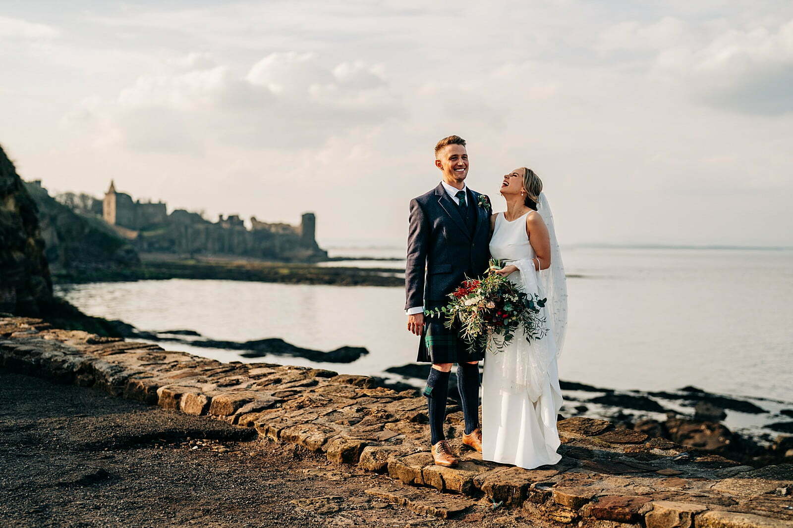 colourful forgans micro wedding bride groom st andrews coastal view couples portrait