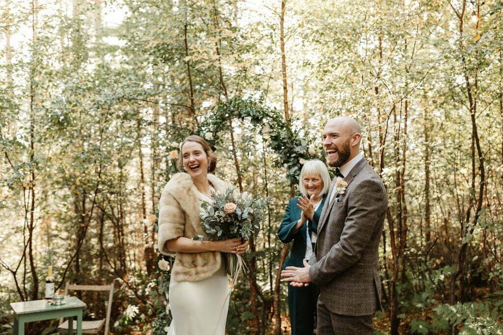 stylish autumnal glen dye elopement, humanist woodland wedding ceremony, hays flower arch, pastel bridal bouquet